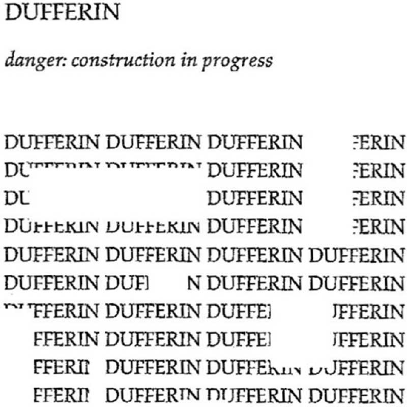 A statue of a dragon on a street