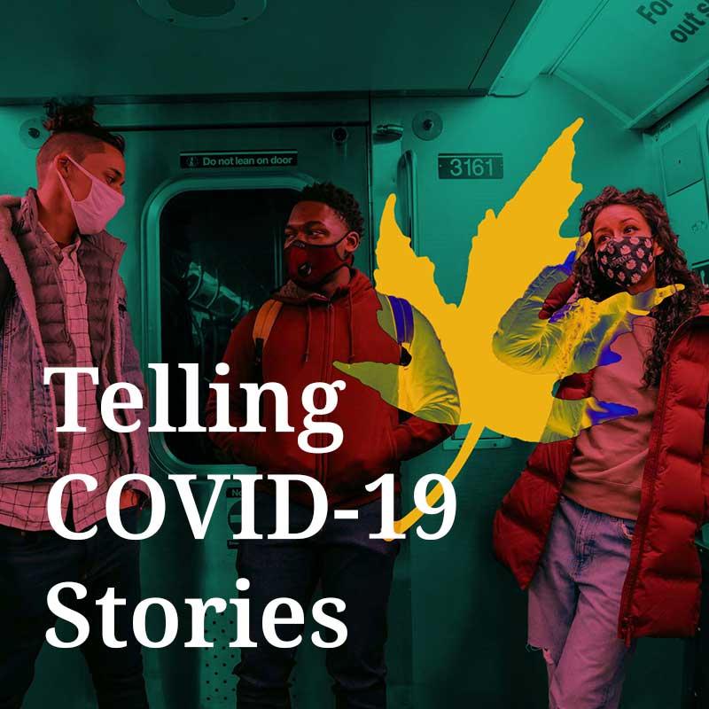 A person holding a book and a rifle